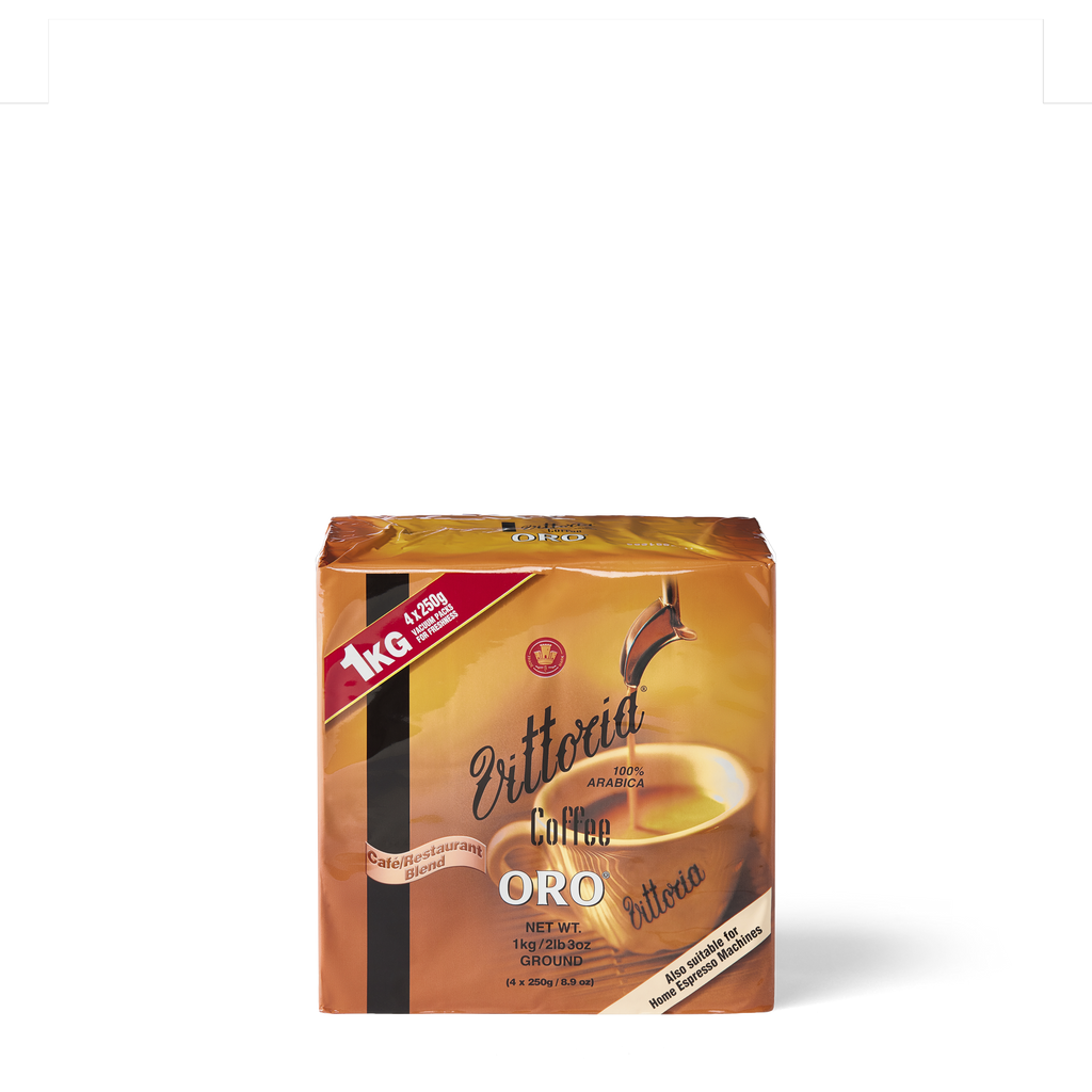 Four 250 g vacuum‑sealed Oro™ ground coffee packs. Front shot of pack with roast description